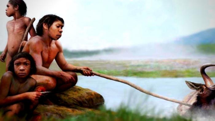 Recreación de una escena de homo sapiens empleando aguas termales para cocinar sus alimentos.