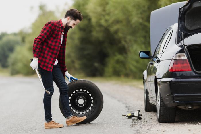 side-view-of-man-with-spare-tire