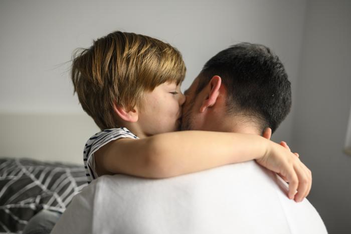 medium-shot-kid-hugging-his-father