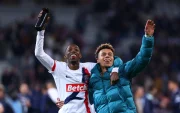 Ousmane Dembele y Désiré Doué festejan tras un partido del PSG.