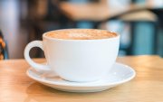 hot caramel macchiato in coffee shop
