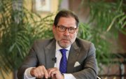Carmigniani es jurista especializado en litigios comerciales.   Fue árbitro del Ciadi, miembro de la Corte Internacional de Arbitraje de la Cámara de Comercio Internacional y consultor del BID.