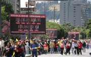 Rostros. Varios carteles con las fotos de los jueces de la Corte fueron expuestos a lo largo de la marcha.