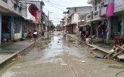 Calles de Babahoyo quedaron cubiertas de agua y lodo tras la inundación que afectó al 90 % del casco urbano.