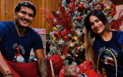 Héctor Bello junto a su esposa e hija.