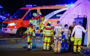 Agentes de policía y personal de seguridad trabajaron cerca del lugar donde varias personas resultaron heridas durante un atropello múltiple en Berlín, el sábado 25 de julio.