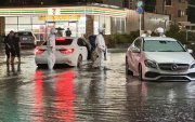 Vista de una carretera inundada tras las fuertes lluvias en Ichikawa, prefectura de Chiba, cerca de Tokio