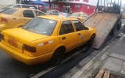 ATM retiene taxi denunciado en redes por circular con placa ilegible.