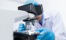 scientist-using-microscope-3938022