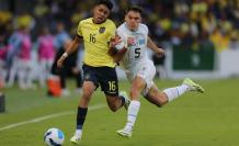 Kendry Paes (left) from Ecuador competes for the ball with Manuel Ugarte Ribeiro from Uruguay