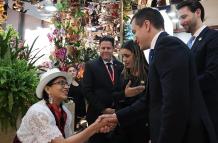 Visita. El presidente durante su llegada al stand de Ecuador, en España.