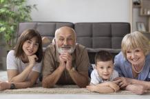 full-shot-happy-family-laying-floor