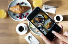 woman-taking-photo-two-croissants