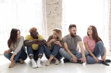 group-young-friends-sitting-floor (1)