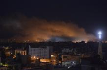 El humo se eleva tras un ataque aéreo israelí en el Dahye, un suburbio en el sur de Beirut, Líbano, a última hora del 20 de octubre de 2024.