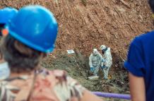 Mundo, Colombia, Encuentran los primeros restos humanos en escombrera de Medellín