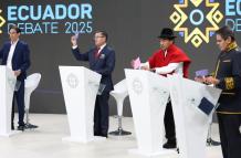 Cuatro de los 16 candidatos presidenciales que participaron en el debate.