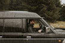man-driving-rain