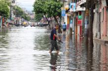 BASURA Y LLUVIA INUND (14251742)