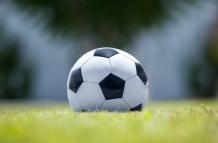 football-on-green-grass-2024-10-17-01-18-58-utc (1)