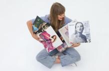 Taylor Swift con todos sus discos.
