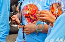 Rosario en la procesión a la Virgen María