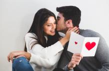 man-kissing-girl-face-this-one-reads-postcard