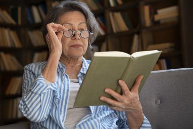 medium-shot-old-woman-library