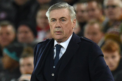(FILES) In this file photo taken on November 27, 2019 Napoli"s Italian head coach Carlo Ancelotti watches his players from the touchline during the UEFA Champions league Group E football match between Liverpool and Napoli at Anfield in Liverpool, north west England on November 27, 2019. Carlo Ancelotti has been named as Everton"s new manager, the Premier League club have announced on December 21, 2019. / AFP / Oli SCARFF FILES-FBL-ENG-PR-EVERTON-ANCELOTTI