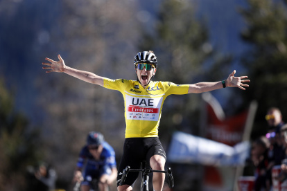 Slovenian rider Tadej Pogacar of UAE Team Emirates celebrates while crossing the finish line to win the seventh stage of the Paris-Nice cycling race over 142,80km from Nice to Col de la Couillole, France, 11 March 2023. (Ciclismo, Francia, Eslovenia, Niza) EFE/EPA/SEBASTIEN NOGIER