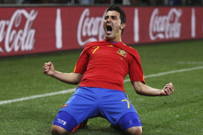 CAPE TOWN, SOUTH AFRICA - JUNE 29: David Villa of Spain celebrates scoring the opening goal during the 2010 FIFA World Cup South Africa Round of Sixteen match between Spain and Portugal at Green Point Stadium on June 29, 2010 in Cape Town, South Africa. (Photo by Alex Livesey - FIFA/FIFA via Getty Images)