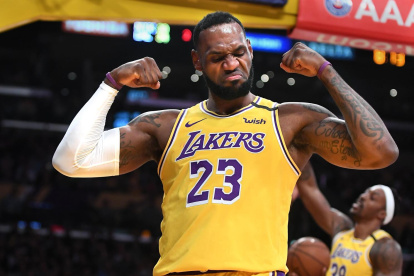 LOS ANGELES, CALIFORNIA JANUARY 7, 2020-Lakers LeBron James celebrates his basket and a foul by the Knicks at the Staples Center Tuesday. (Wally Skalij/Los Angerles Times)