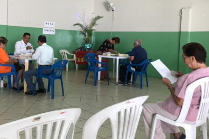 Los bonos se entregan por orden alfabéticos en el edificio principal.