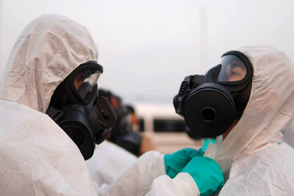 This handout from the Royal Thai Navy taken and released on Feburary 4, 2020 shows navy officials preparing for the arrival of a plane carrying Thai nationals who had been evacuated from Wuhan, the epicentre of the novel coronavirus outbreak, at U-Tapao Airport in Rayong. -----EDITORS NOTE --- RESTRICTED TO EDITORIAL USE - MANDATORY CREDIT "AFP PHOTO / ROYAL THAI NAVY " - NO MARKETING - NO ADVERTISING CAMPAIGNS - DISTRIBUTED AS A SERVICE TO CLIENTS 
 / AFP / ROYAL THAI NAVY / Handout / -----EDITORS NOTE --- RESTRICTED TO EDITORIAL USE - MANDATORY CREDIT "AFP PHOTO / ROYAL THAI NAVY " - NO MARKETING - NO ADVERTISING CAMPAIGNS - DISTRIBUTED AS A SERVICE TO CLIENTS 

 THAILAND-CHINA-HEALTH-VIRUS