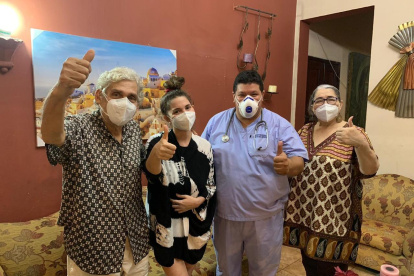 Romina con sus progenitores