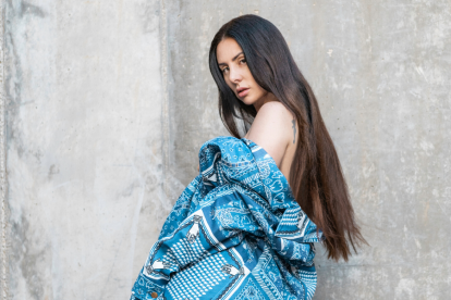 Es una de las raperas con más años de trayectoria. Ha colaborado con Nelly Furtado y Julieta Venegas.