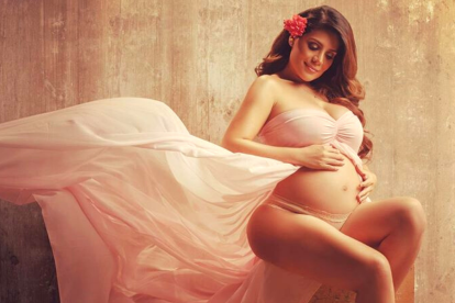 Parte de su sesión de fotos de su tercer embarazo.