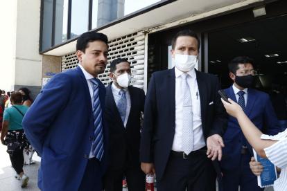 Salida. Alfredo Arboleda y Cristian Romero, abogados de los Bucaram Pulley, se declararon en resistencia.