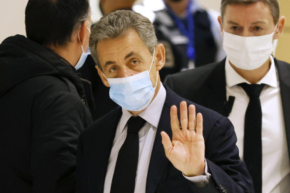 Former French president Nicolas Sarkozy (C) arrives at the court for his trial on corruption charges in the so-called "wiretapping affair" in Paris, France, 10 December 2020 (reissued 01 March 2021).