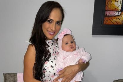 Con su hija María José.