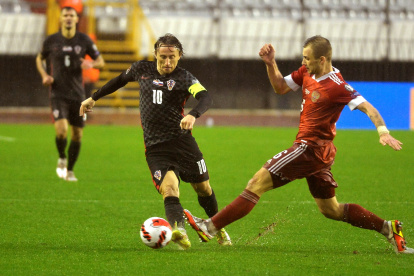 Luka Modric (c), pieza clave en la clasificación del conjunto croata.