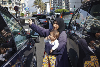 Refugiados sirios pidiendo lismonas en las calles de Líbano. Las desigualdades económicas se acentuarán en el mundo en este año.
