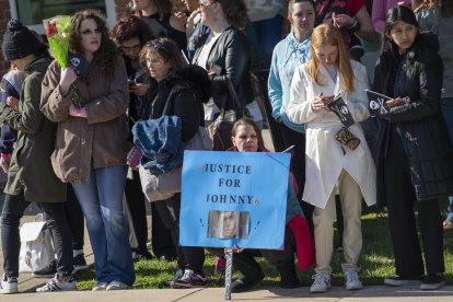 Fans wait for the arrival of American actor Johnny Deep prior to the start of Depp v Heard at the Fairfax County Courthouse