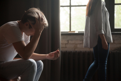 Young frustrated sad man holding wedding engagement ring, wife or girlfriend leaving depressed heartbroken husband, couple breaking up divorce concept, relationships breakup, proposal rejection