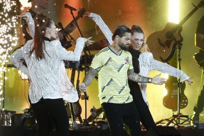 El colombiano Maluma durante su actuación este sábado en la inauguración del "FIFA Fan Festival" de Doha, en el que se interpretó el primer himno de la fiesta, "Tukoh Taka".El Mundial FIFA Qatar 2022 se disputará en el país árabe del 20 de noviembre al 18 de diciembre.