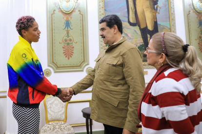 La deportista venezolana en su visita oficial con Maduro.
