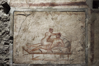 Uno de los frescos de la Casa de los Vettii, una de las domus mejor conservadas de la urbe romana de Pompeya.