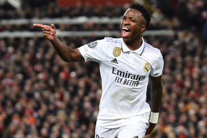 Vinicius Junior of Real Madrid celebrates after scoring his second goal during the UEFA Champions League, Round of 16, 1st leg match between Liverpool FC and Real Madrid in Liverpool, Britain, 21 February 2023. (Liga de Campeones, Reino Unido) EFE/EPA/Peter Powell