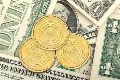 Representación.- La criptomoneda USDC cuesta menos que un dólar.