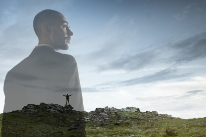 Looking on. Businessman with landscapes on background, double exposure. Lives in megapolis but needs to find herself face to face with nature. Dreams about mental balance. Psycology, eco concept.